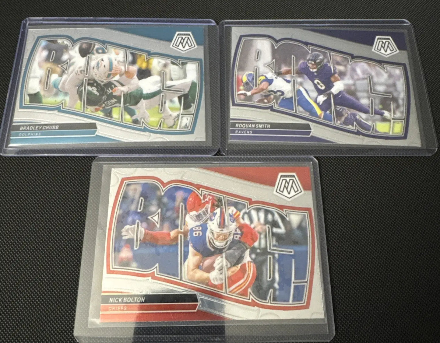 Three Panini Mosaic Football trading cards from the 2024 Mosaic Football Bang complete set
