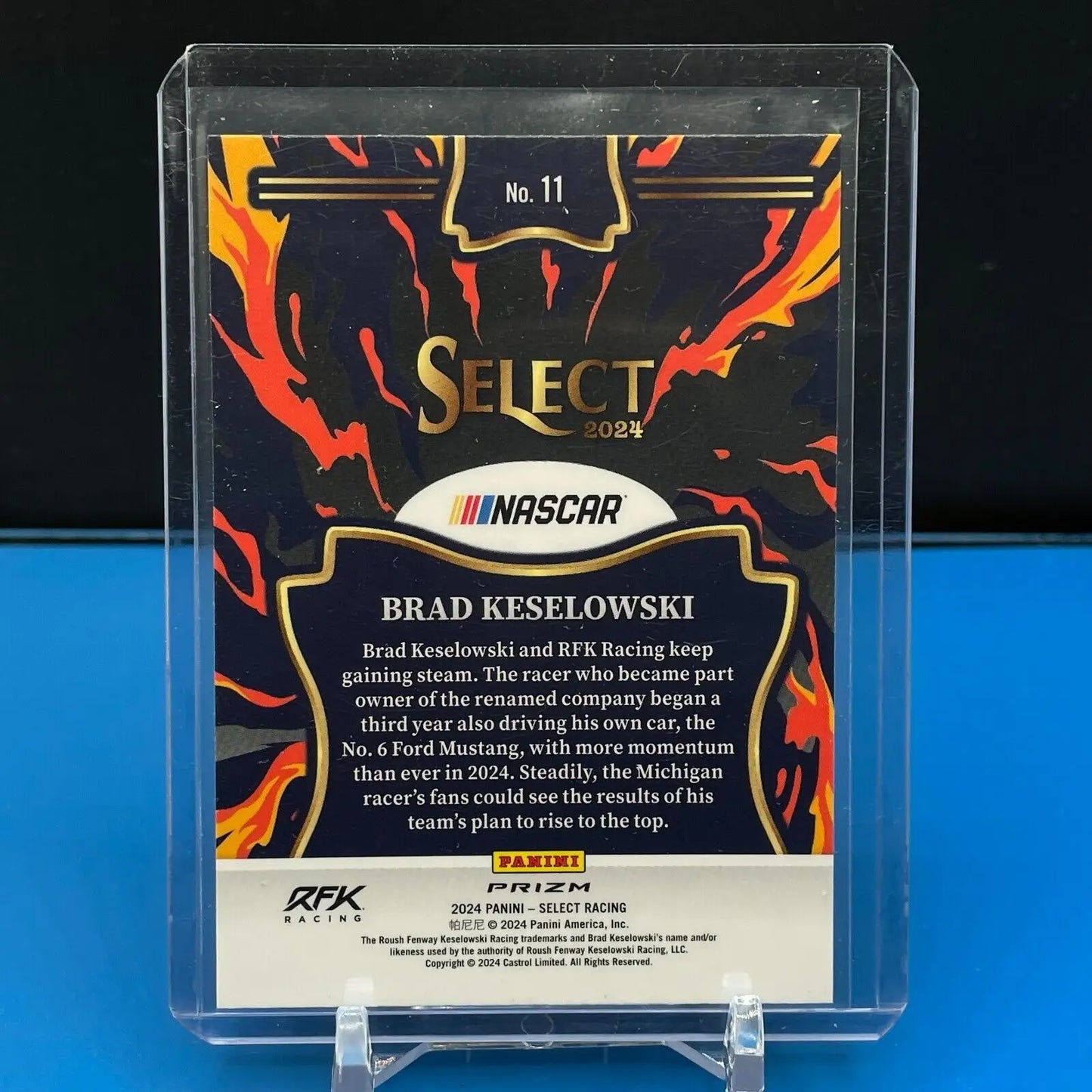 NASCAR trading card in protective case featuring Flash Prizm design of Brad Keselowski