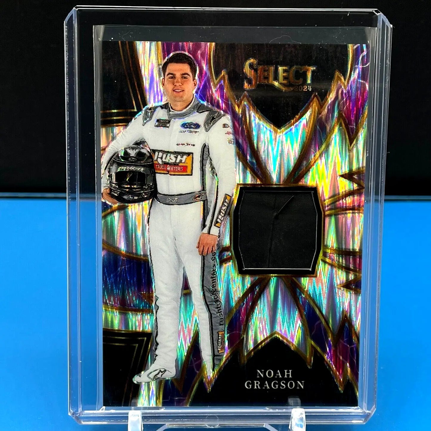 Racing trading card of Noah Gragson in white firesuit from Panini Select Racing