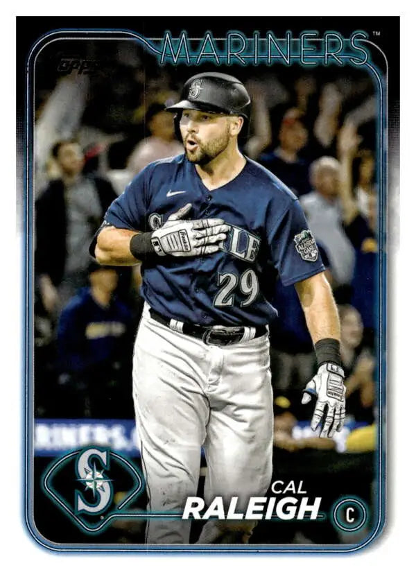 Baseball card of Cal Raleigh in Seattle Mariners navy and white uniform