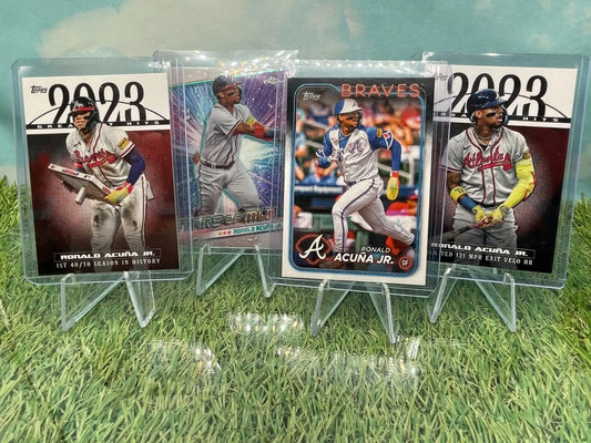 Four Topps Baseball Series Ronald Acuña Jr. cards featuring Atlanta Braves players