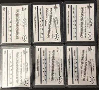Six Topps Chrome Football refractor trading cards in protective cases from the football refractor lot