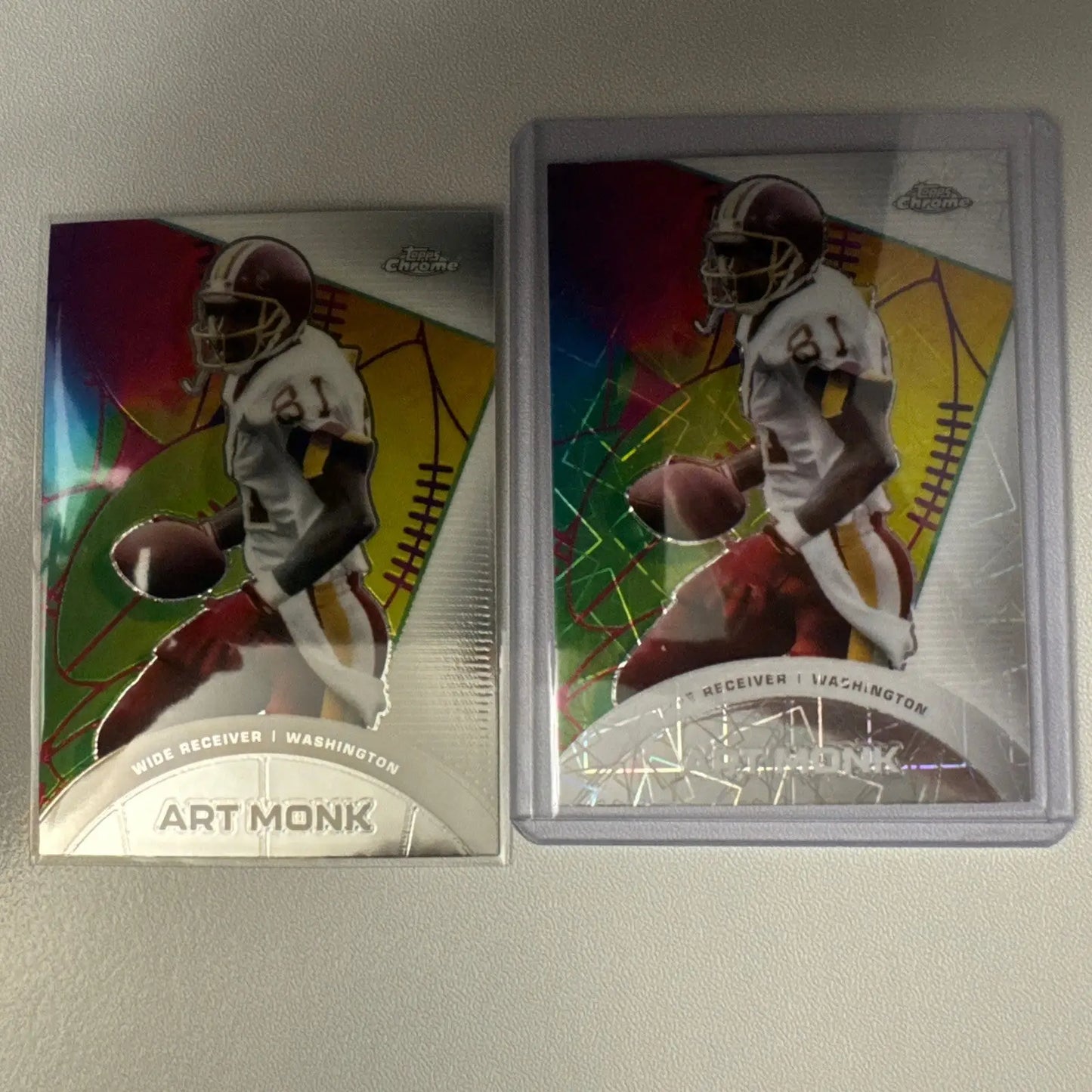 Two Topps Chrome Art Monk Laser Refractor football trading cards in product 2024 Topps Composite