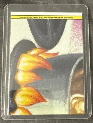 Garbage Pail Kids trading card in clear sleeve from 2024 Topps Chrome Series 7