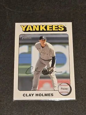Clay Holmes baseball card 2024 Topps Heritage with white border featuring Clay Holmes
