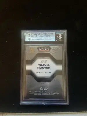 Graded Travis Hunter football card from 2024 Wild Card Automania with American Flag holographic design