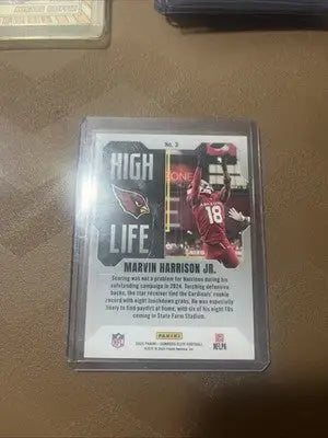 Football trading card featuring Marvin Harrison Jr. Donruss Elite High Life Orange /199