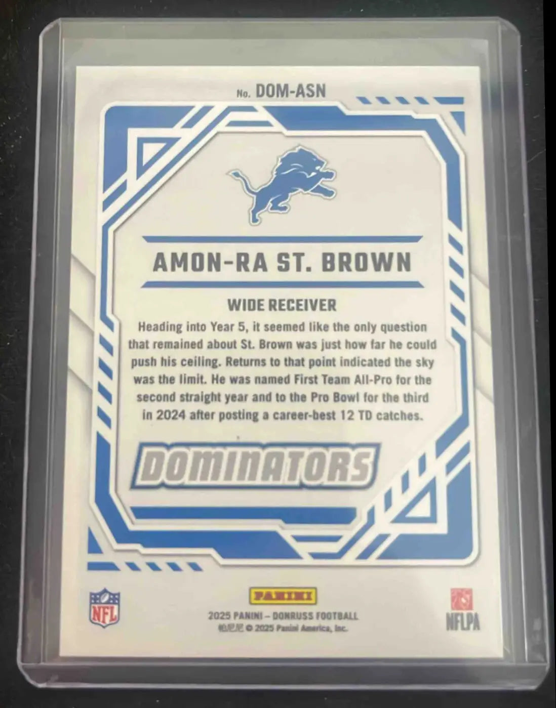 2025 Panini Football Donruss Amon-Ra St. Brown Detroit Lions card featuring NFL star
