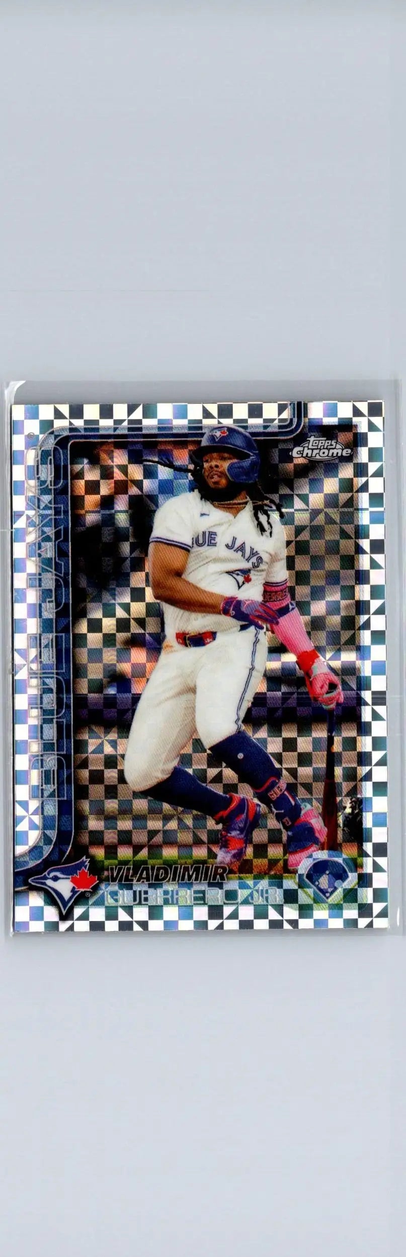 Baseball trading card featuring Vladimir Guerrero Jr. in Toronto Blue Jays uniform with checkered foil pattern from Topps Chrome 2025
