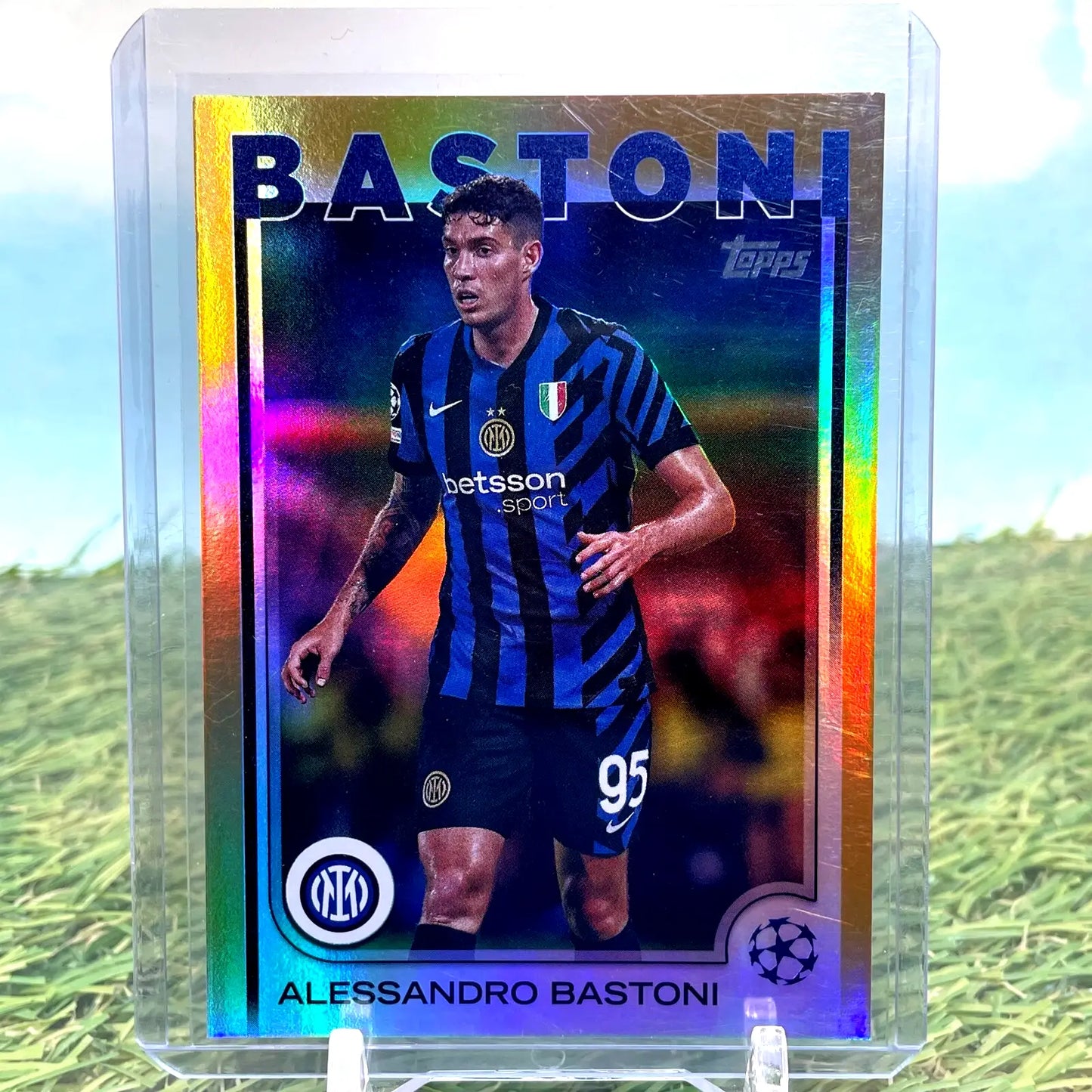 Alessandro Bastoni soccer card from 2025 Topps UEFA Club Competitions series with gold refractor