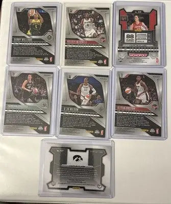 Basketball trading card lot featuring WNBA All-Star players with a black and white logo card