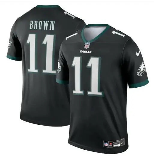 Two black Philadelphia Eagles Nike Legend jerseys with green trim, number 11, front and back featuring BROWN