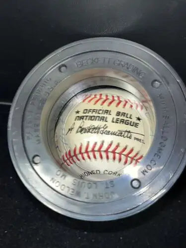 Auto ball baseball featuring Aaron Mize Reese Berra HOF in a display case with Beckett certification