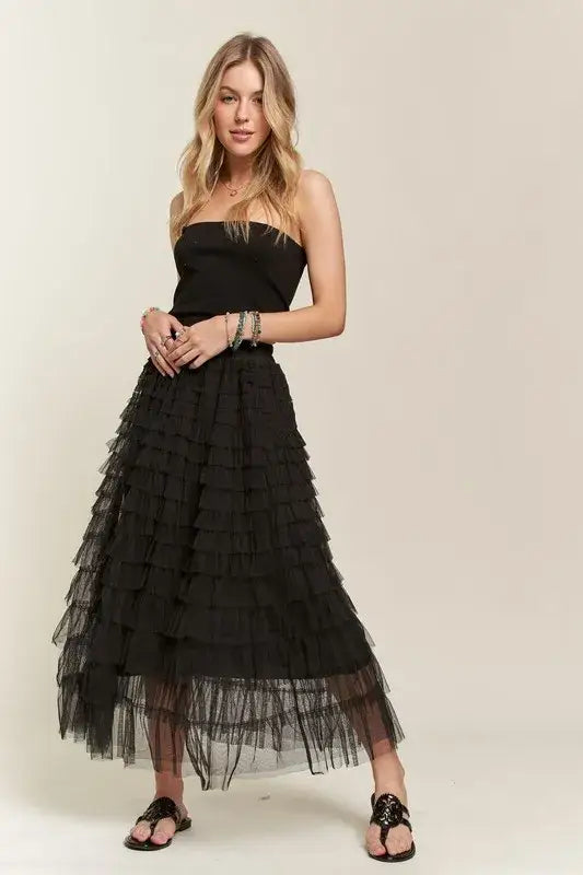 Black strapless tulle dress with layered mesh skirt and satin bodice for elegant style