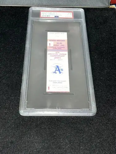 Encased Oakland A’s ticket from ALCS Oct 5 1974 featuring Catfish Hunter and Baltimore Orioles