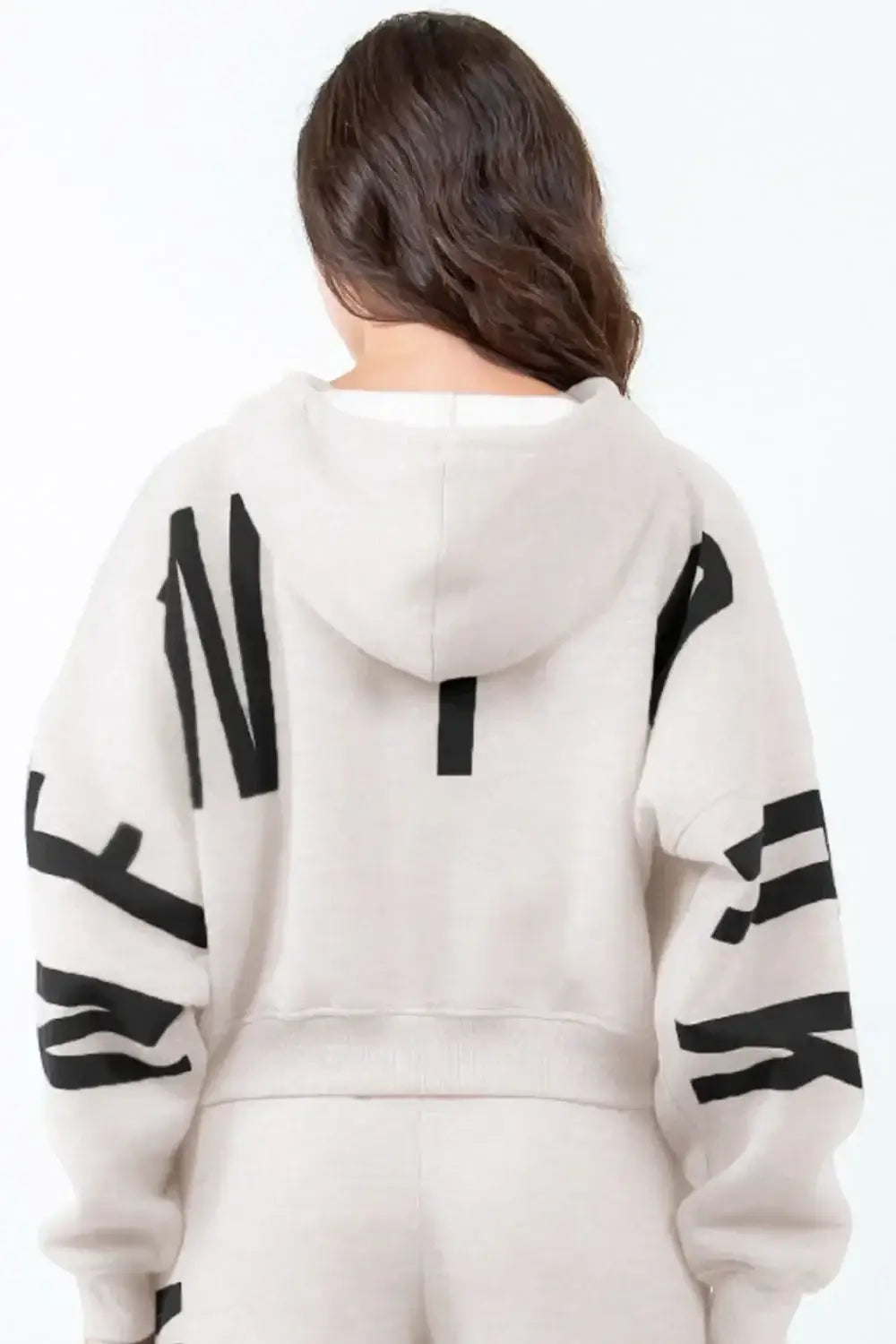 Women’s light beige cropped hoodie with black letter graphic long sleeve design