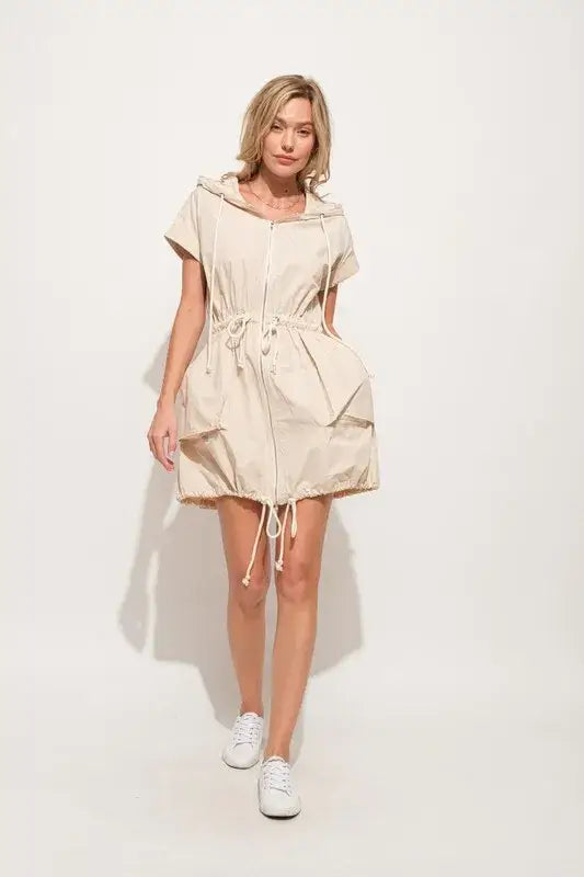 Beige short sleeve string details hooded mini dress with drawstring waist and front pockets