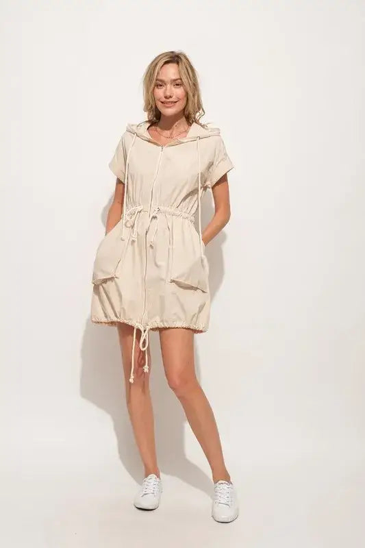Beige hooded utility mini dress with short sleeves and stylish string details
