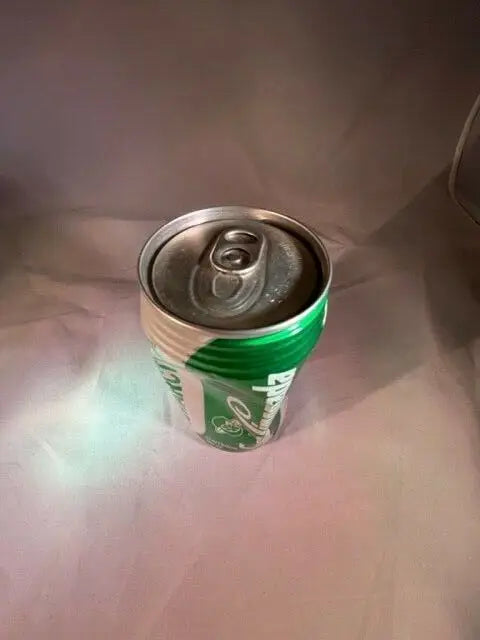 Crushed Antarctica Soda Limonada 12oz aluminum can in green and white hues