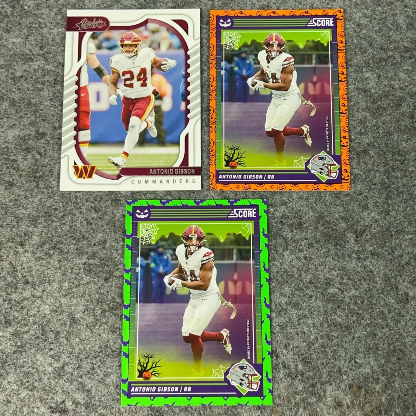 Three Antonio Gibson Washington football trading cards in mint preowned condition