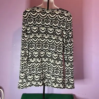 Black and white long sleeve ruffle front blouse with abstract scalloped pattern