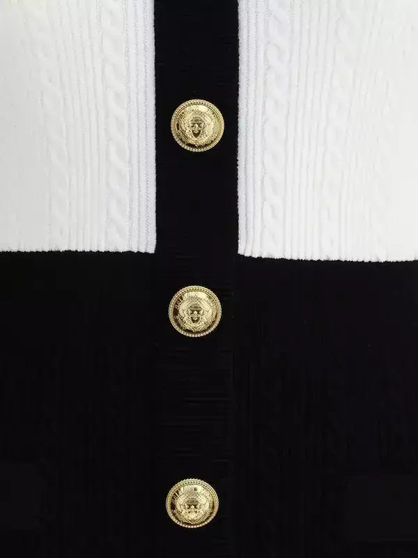 Black and white knit cardigan with gold buttons, perfect for BALMAIN braided pattern midi dress
