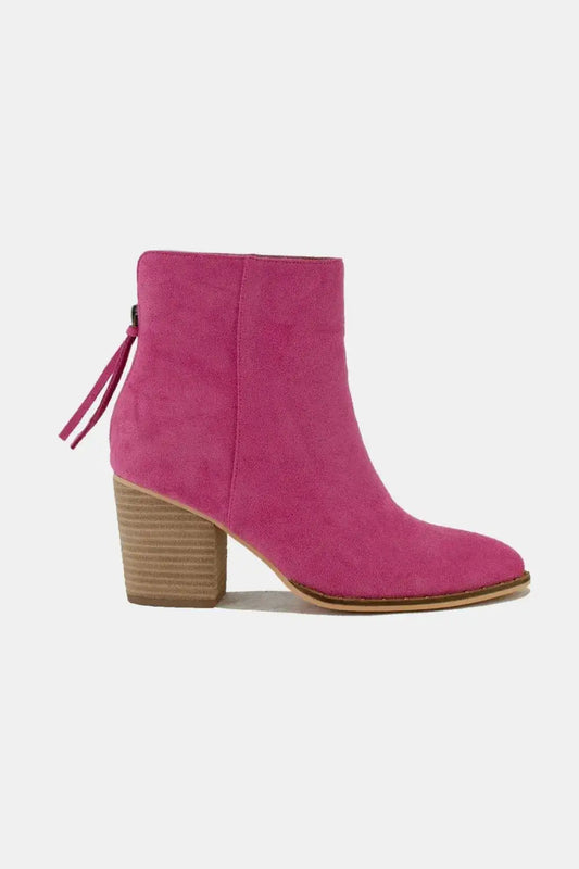 Magenta suede point toe ankle booties with wooden heel and side zipper from Beast Fashion