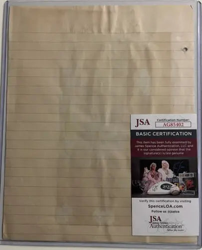 Lined paper featuring Bob Feller signed magazine scrapbook page with authentication sticker