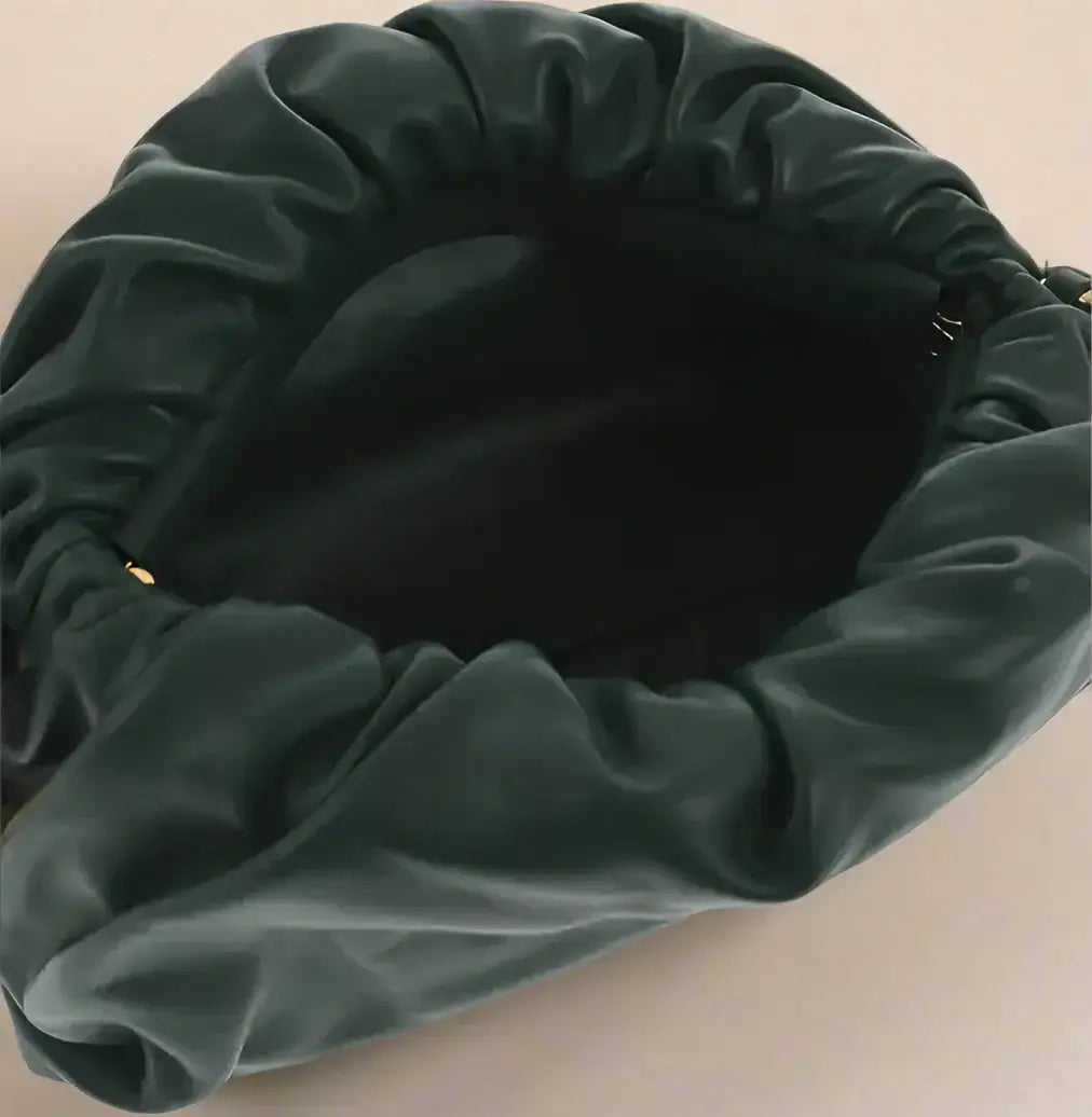 Dark green leather velvet drawstring bag from Bottega Veneta with magnetic closure