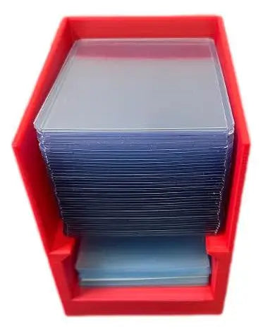 Break Buddy red plastic box filled with clear penny sleeves for card protection