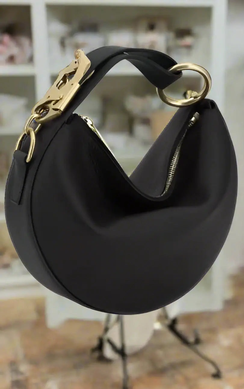Black crescent-shaped Burberry womens hobo bag with gold hardware for women