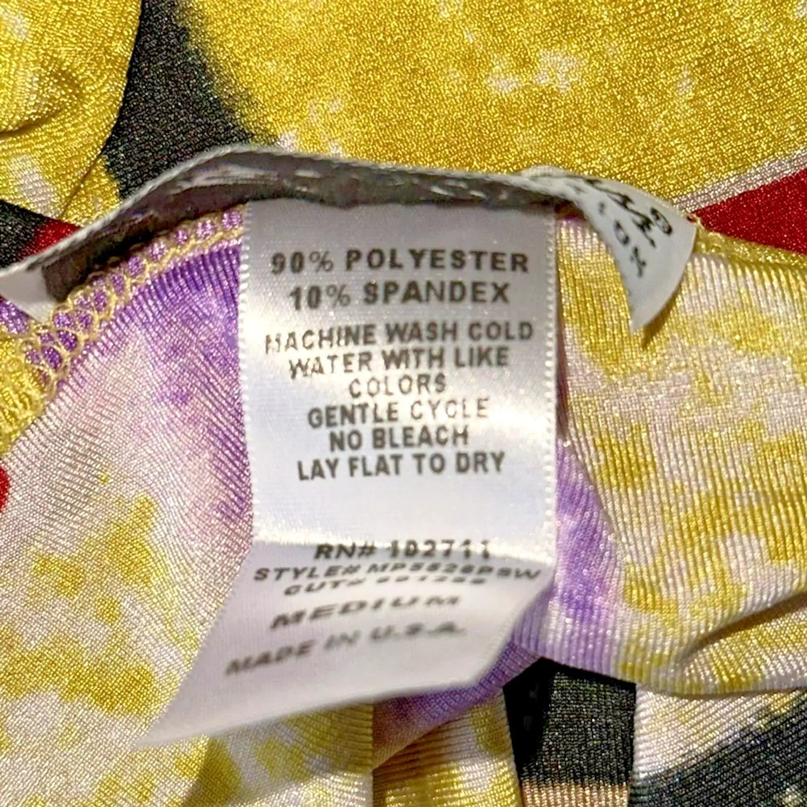 Clothing care label on Carolyn Strauss Geometric Print Pullover Blouse size medium