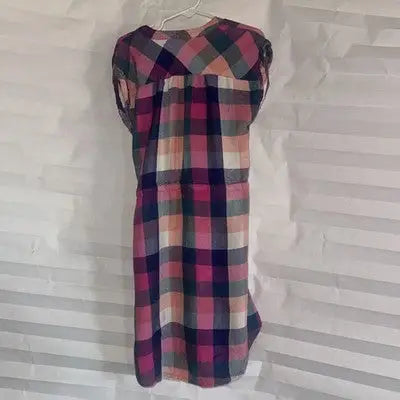 Pink, blue, and white plaid short sleeve dress with button front and elastic waist