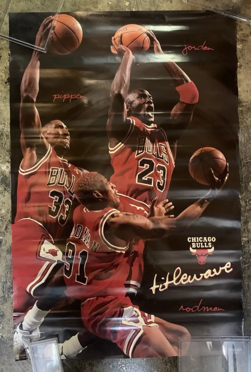 Vintage Chicago Bulls poster featuring Michael Jordan, Scottie Pippen, Dennis Rodman in action sports memorabilia