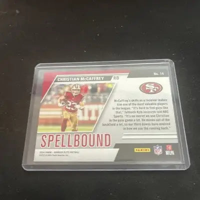 Christian McCaffrey trading card from Donruss Elite 2024 in protective sleeve