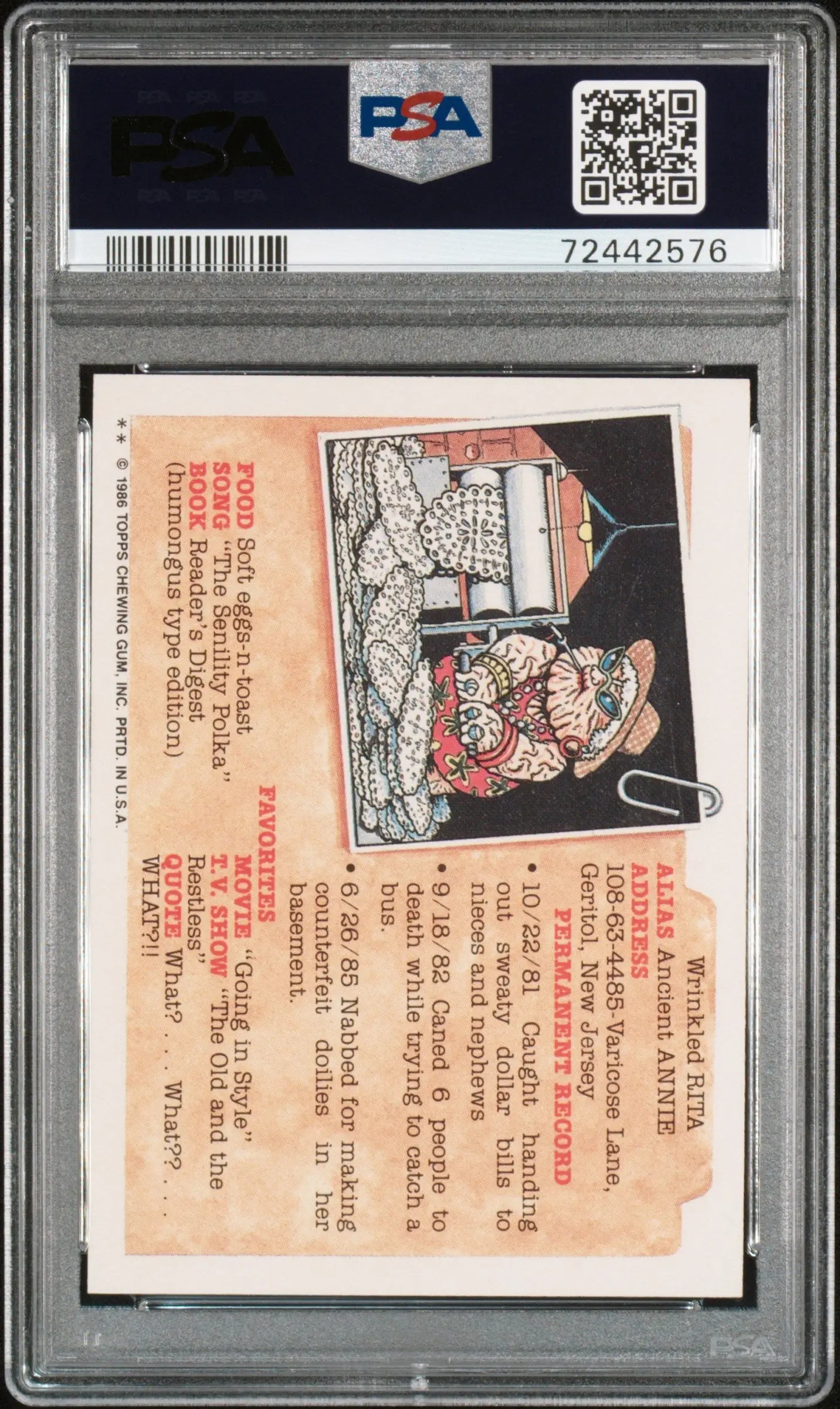 PSA-graded Clark Can’t 1986 Topps Garbage Pail Kids #172b in protective holder with newspaper