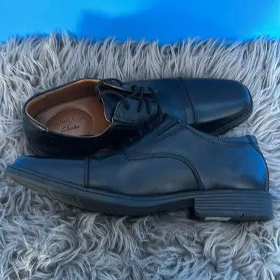 Black leather men’s dress shoes displayed in Clarks Black Leather Dress Shoes Men’s Size 8.5 Formal Oxford Classic