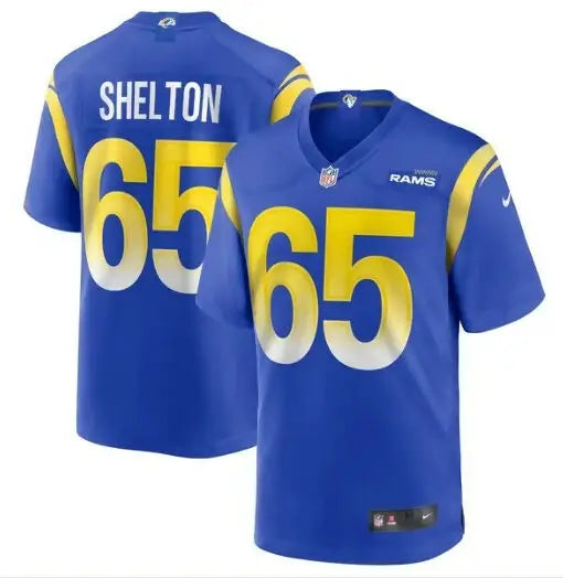 Royal blue Los Angeles Rams Nike Game Jersey with yellow and white number 65 and Shelton name
