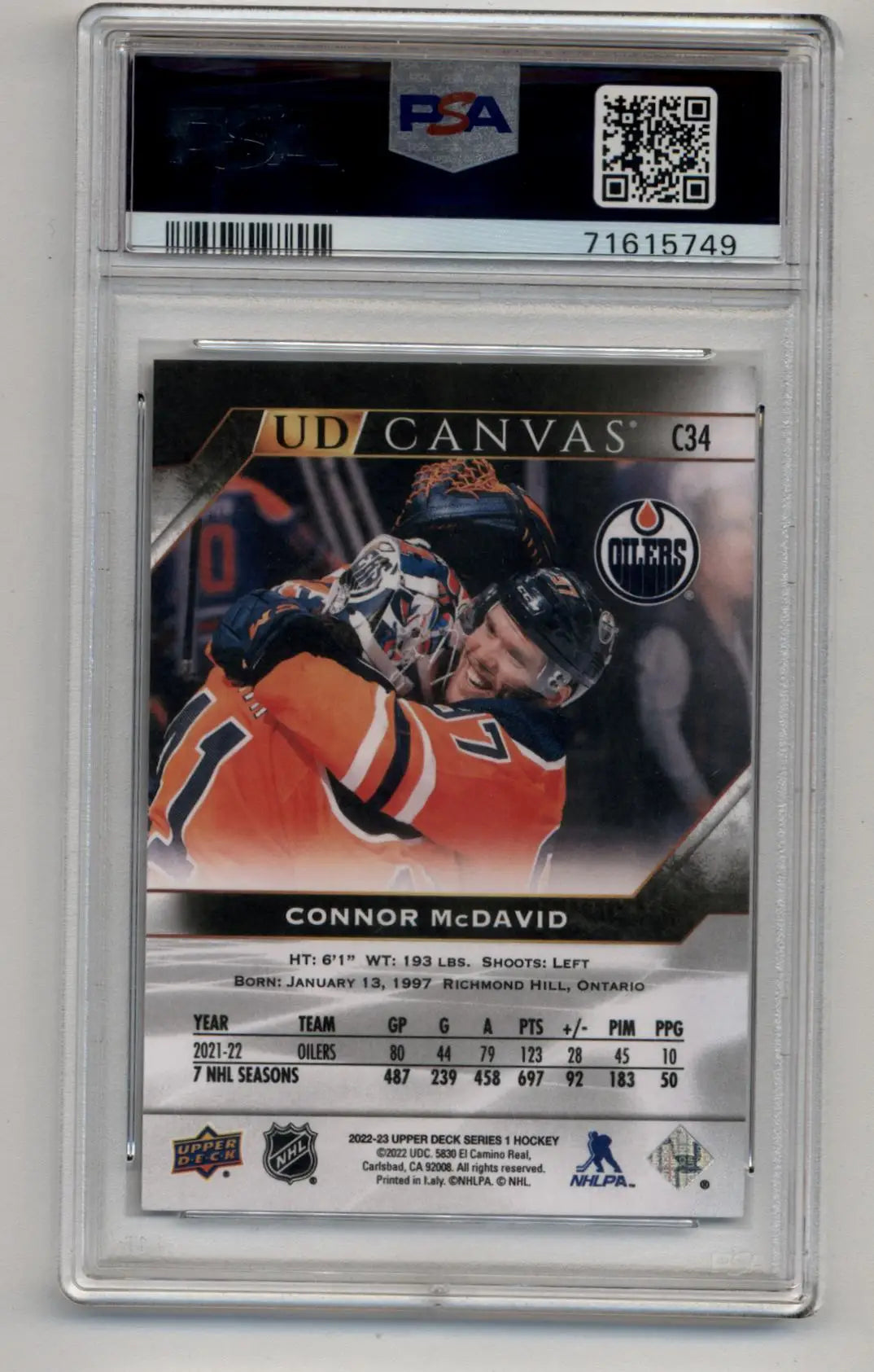 PSA-graded Connor McDavid Upper Deck Canvas Black and White hockey card in shooting pose