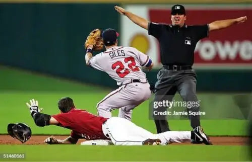 Craig Biggio photo matched NIKE PRO game used cleats during thrilling baseball gameplay