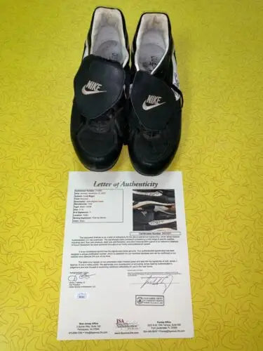 Black Nike soccer cleats with authenticity letter, Photo matched to Craig Biggio