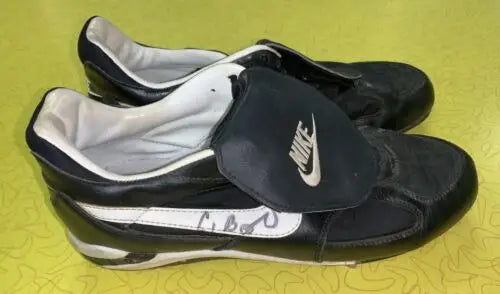 Pair of black and white Nike shoes used by Craig Biggio, photo matched for authenticity