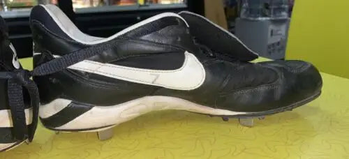 Black and white Nike cleats worn by Craig Biggio, photo matched and JSA certified