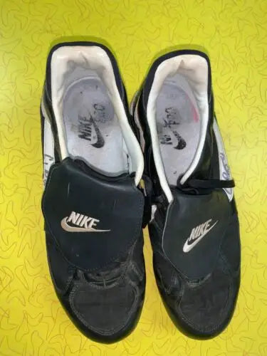 Pair of black Nike soccer cleats from Craig Biggio, photo matched for authenticity