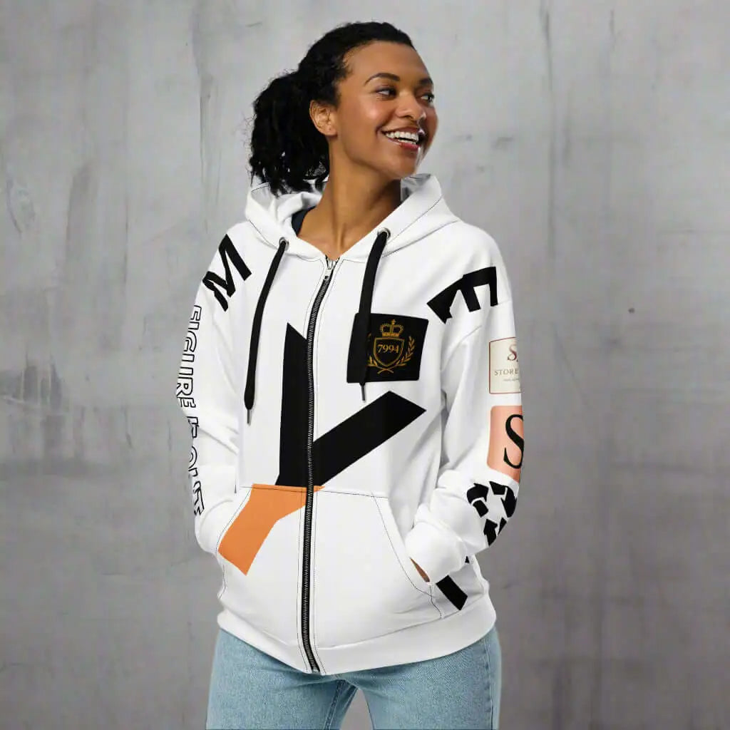 White CROSSROADS Unisex Zip Hoodie with black, orange, and rose gold graphic designs