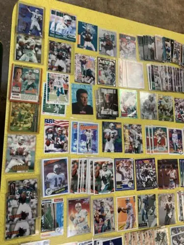 Collection of Dan Marino Miami Dolphins trading cards from Upper Deck and Topps