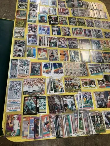 Collection of Dan Marino Miami Dolphins trading cards including Upper Deck and Topps