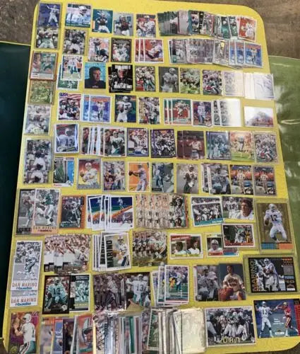 Collection of Dan Marino Miami Dolphins football trading cards including Upper Deck