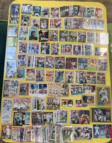 Collection of Dan Marino Miami Dolphins trading cards from Upper Deck and Topps