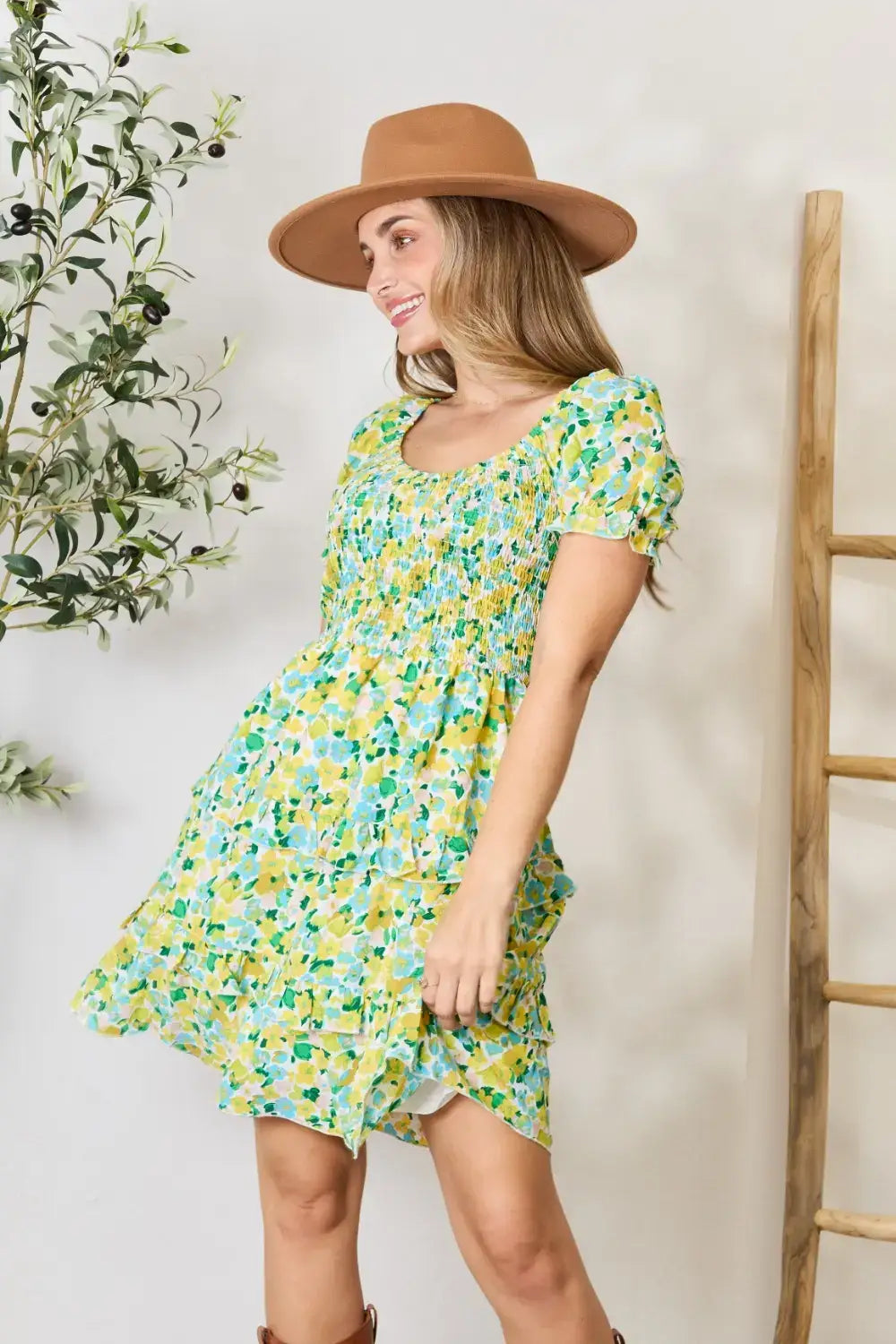 Green and yellow floral mini dress with scoop neck and puff sleeves for stylish summer wear